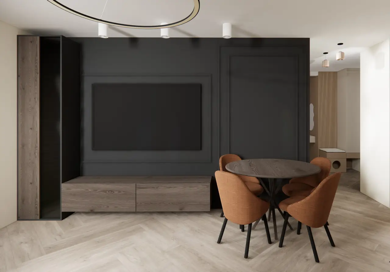 salon z antracytową ściana i rudymi krzesłami